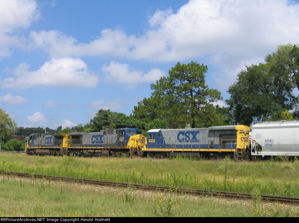 CSX 5552 trails two CW44AC's westbound